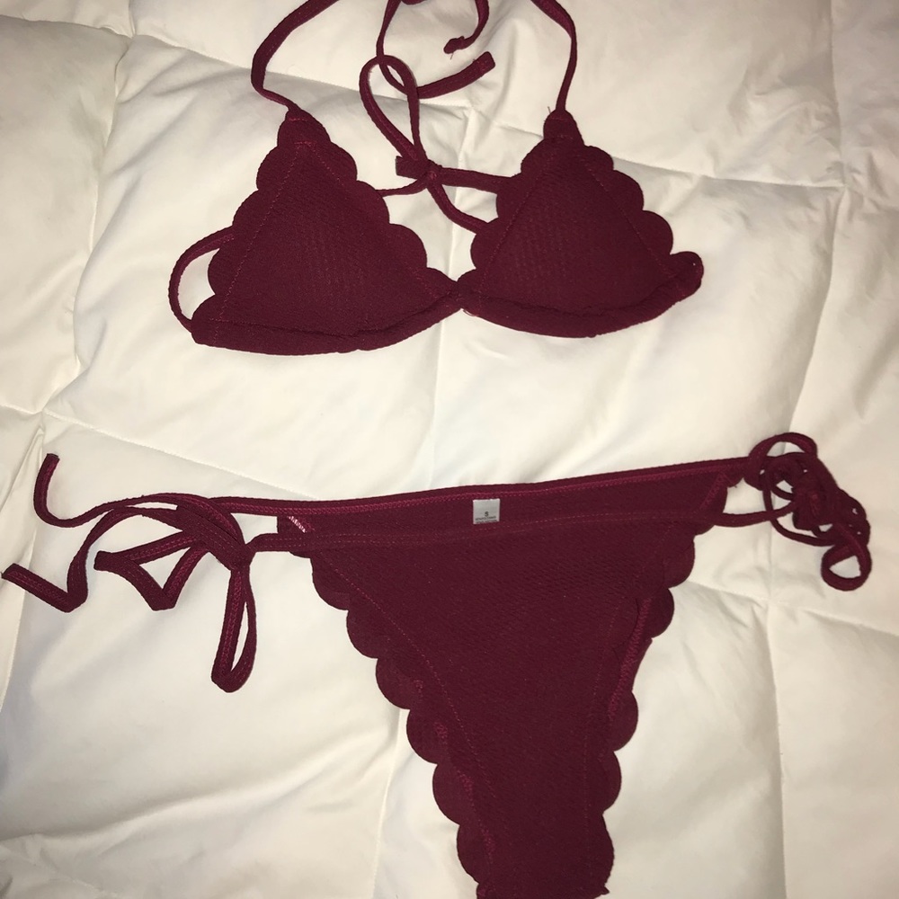 deep red bikini.  cheeky bottoms